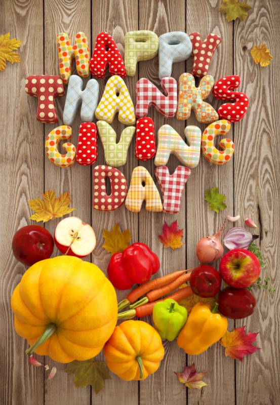 Happy Thanksgiving, America! - Autumn Thanksgiving Day composition with handmade text, fruits and vegetables on wooden background.